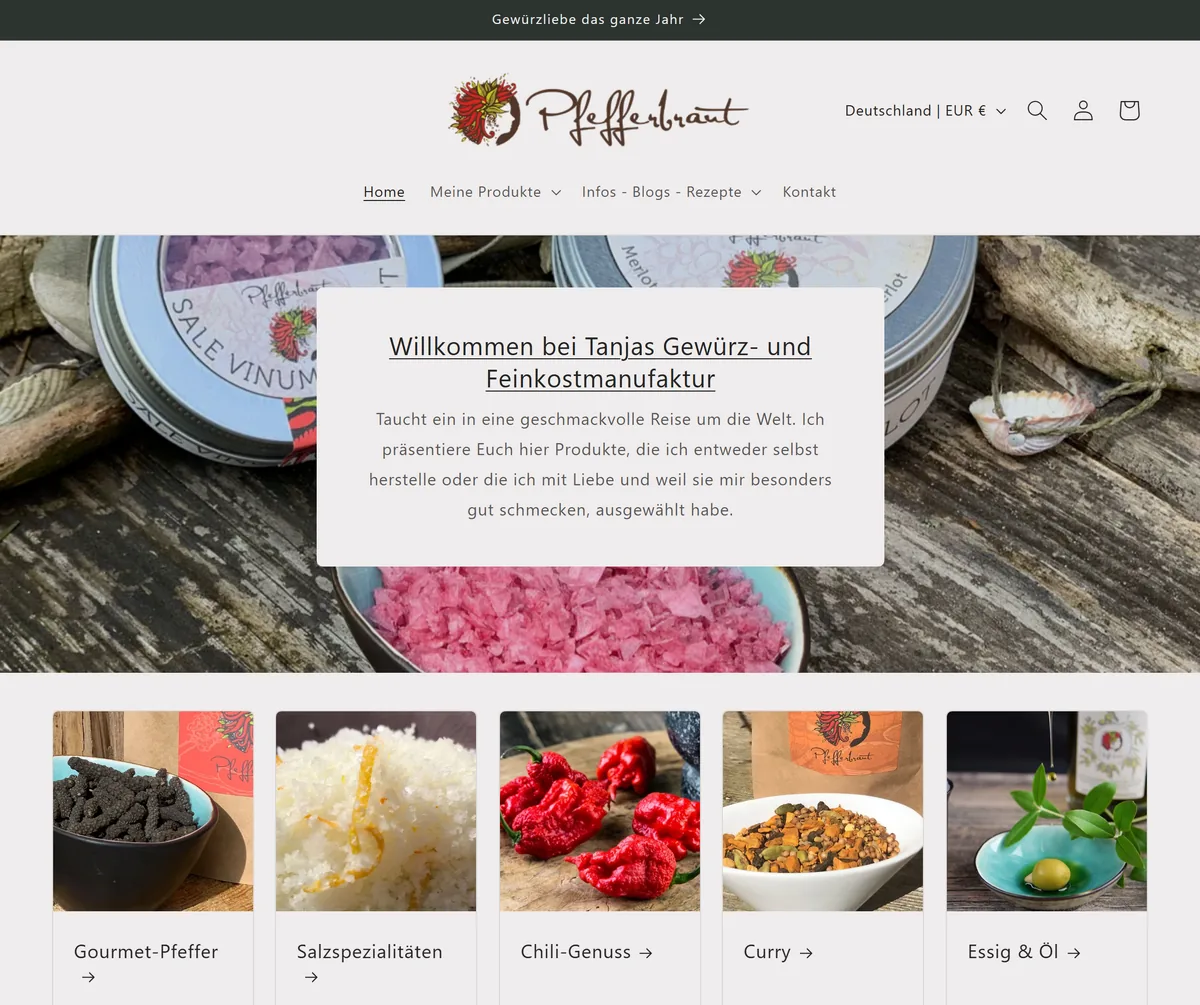Home page of the online shop pfefferbraut.de with spice tins and product categories